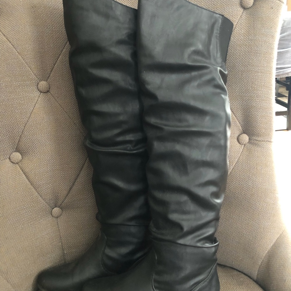 Knee high boots.